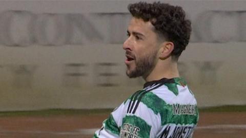 Mikey Johnston celebrates after scoring for Celtic