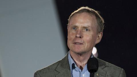 Mr Morrison speaking at t a microphone during his Australian of the Year acceptance speech on 25 January 2016.