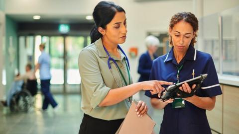 A stock image of NHS staff