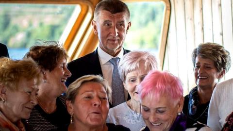 Czech Prime Minister Andrej Babis poses for a photograph with fans during his campaign cruise with supporters on a ship at Brno Reservoir on October 01, 2021