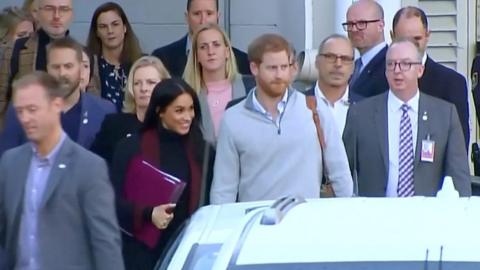 Harry and Meghan leaving the airport