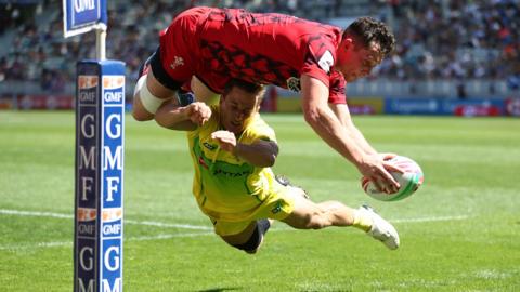 Wales' Joe Goodchild scores against Australia