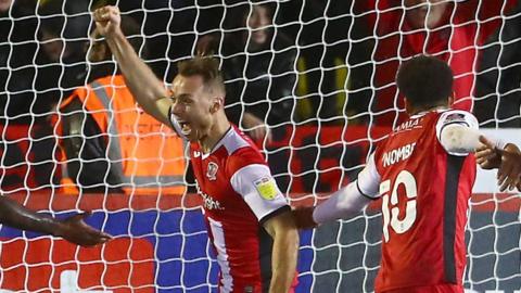 George Ray celebrates scoring Exeter's winner