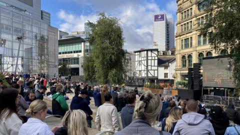 Crowds watch at Exchange Square