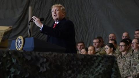 US President Donald Trump speaks to the troops during a surprise Thanksgiving day visit at Bagram Air Field