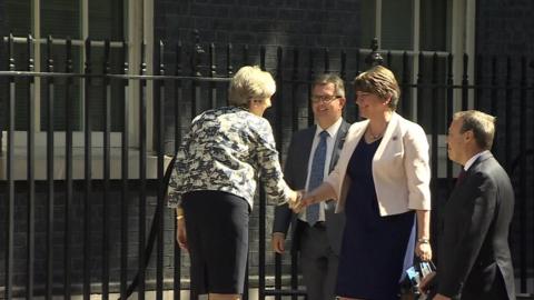 Theresa May shakes Arlene Foster's hand in Downing Street as she arrives for talks