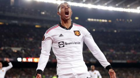 Marcus Rashford celebrates scoring against Barcelona