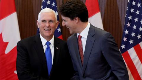 Canada PM Justin Trudeau and US Vice President Mike Pence shake hands in Ottawa