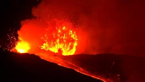 Mount Etna lights up night sky