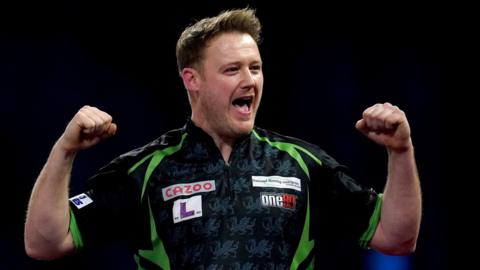 Jim Williams celebrates beating James Wade at the PDC World Darts Championship