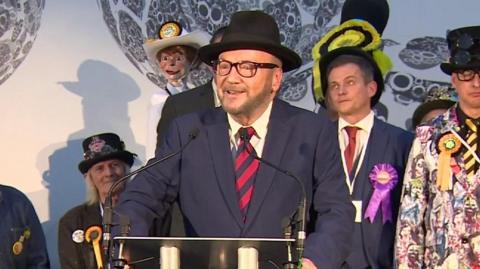 George Galloway on stage