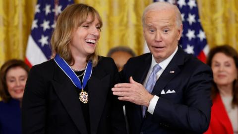 President Joe Biden awards the Medal of Freedom to swimmer Katie Ledecky in the White House on 3 May 2024