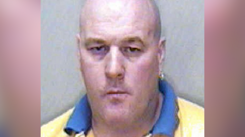 A police mugshot of Colin Gunn