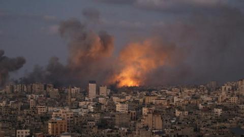 Smoke rises following an Israeli air strike in northern Gaza City