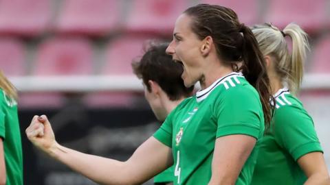 Sarah McFadden celebrates her goal