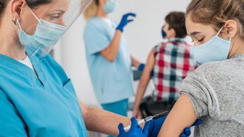 Girl getting a jab