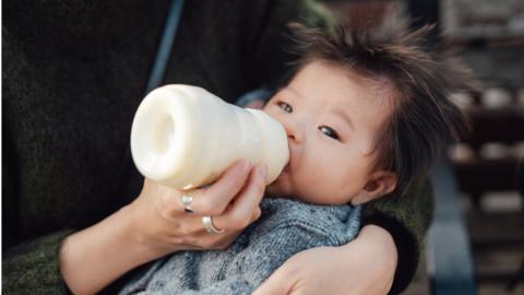 baby with a bottle