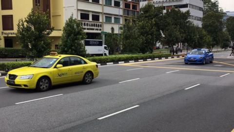 Yellow blue taxis in Singapore