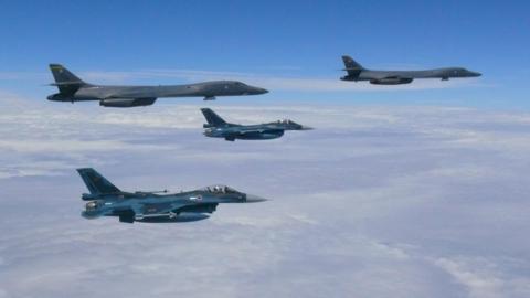 This image obtained from the US Air Force shows two Air Force B-1B Lancers (Top L ^ R) flying from Andersen Air Force Base, Guam, for a 10-hour mission, flying in the vicinity of Kyushu, Japan, the East China Sea, and the Korean peninsula on August 7, 2017