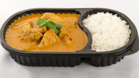 Curry and rice in a takeaway pot