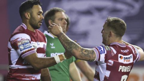 Wigan Warriors celebrate a Bevan French try against Wakefield