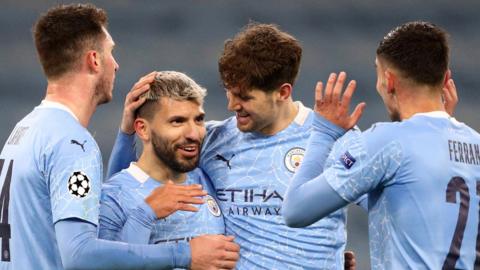 Sergio Aguero celebrates scoring against Marseille