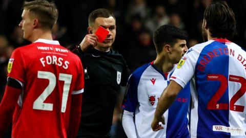 John Buckley is shown a straight red card