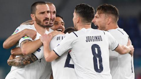 Italy players celebrate