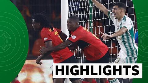 Angola forward Mabululu celebrates his goal