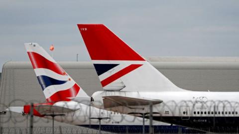 British Airways passenger planes are pictured at the apron at London Heathrow Airport