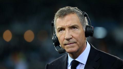 Sky Sports pundit Graeme Souness pictured wearing a headset at pitchside