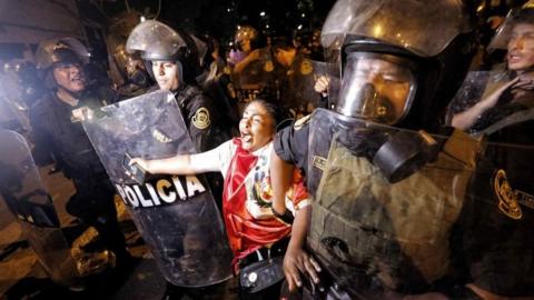 Police officers arrest a woman who was protesting against the Government of Dina Boluarte, in Lima, Peru, 31 January 2023.