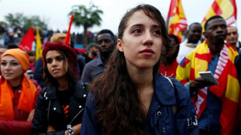 People demonstrate in support of the mayor of the town Domenico Lucano in front of his house in the southern Italian town of Riace