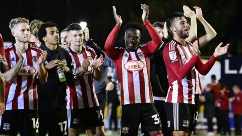 Exeter City celebrate beating Luton Town