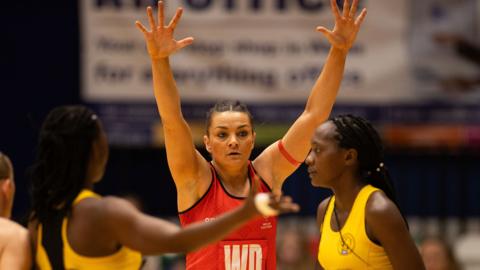 Wales co-captain and dual international Nia Jones tries to hault a Ugandan attack