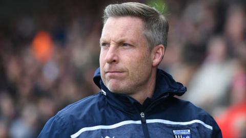 Neil Harris previously managed Millwall, Cardiff City and Gillingham