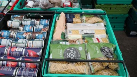 food laid out in crates at a food bank