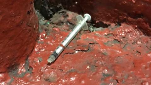 Needle left outside trader Terry Milligan's storage unit in Lisle Street