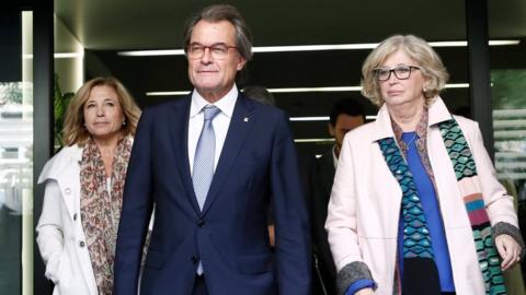 Artur Mas (C); former regional minister Irene Rigau (R), and former regional minister Joana Ortega (L), leave the Spanish Court of Auditors in Madrid, Spain, 10 October