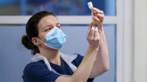 Nurse with vaccine