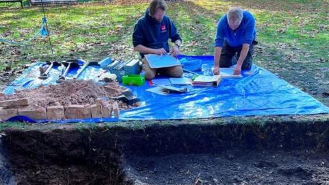 Archaeologists at the dig in October