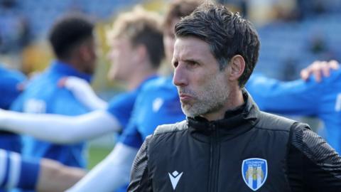 Colchester head coach Danny Cowley looks on during a training session
