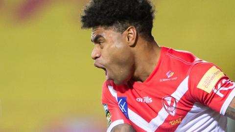 Kevin Naiqama celebrates his try for St Helens