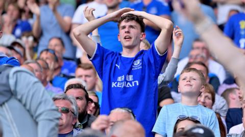 Everton fans at a moment of high stress last season