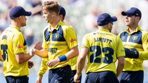 Birmingham Bears celebrate taking a wicket