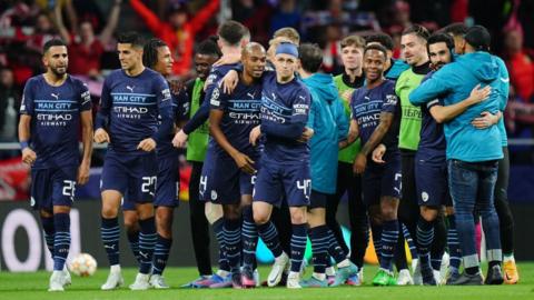 Man City players celebrate