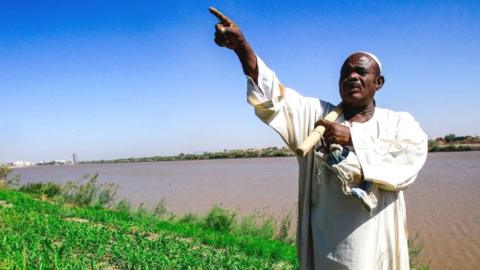 A farmer by the Nile in Sudan