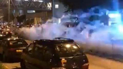 Screen grab from social media shows fireworks fired from moving car in Hong Kong. 31 July 2019