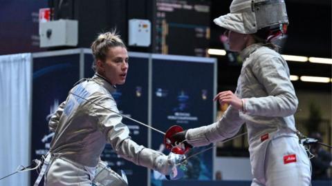 Ukraine's Olga Kharlan competes against Russian Anna Smirnova