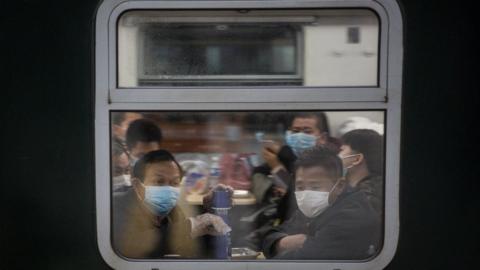 Train operation while the train from Xi'an to Guangzhou stops in Wuhan on April 8,2020 in Wuhan, Hubei Province, China. The Chinese government lifted travel restrictions from April 8, after almost 11 weeks of lockdown to stem the spread of COVID-19